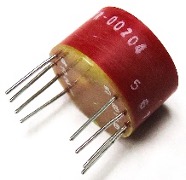 potted cylindrical can with ~8 through-hole pins in two rows